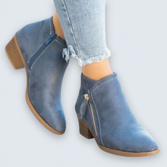 Women's stylish waterproof ankle boots, perfect for comfortable everyday wear & all-weather protection.