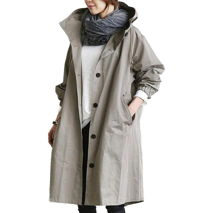 Stylish women's long raincoat, a waterproof trench coat for versatile outdoor and casual wear.