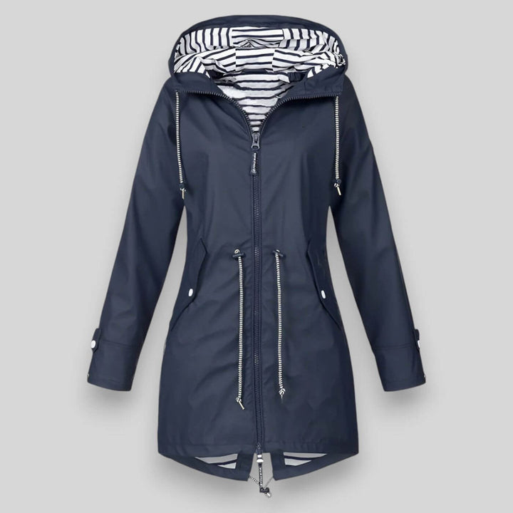 Women's stylish waterproof rain jacket for all weather. Lightweight outerwear with adjustable features for outdoor fashion.