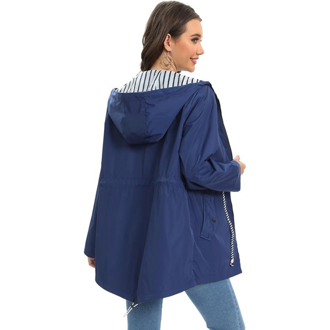 Full-length view of a women's chic waterproof jacket, designed for ultimate weather protection and modern fashion.