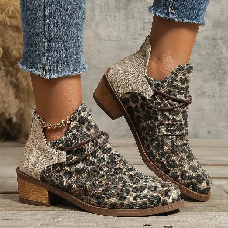 Stylish women's woven ankle boots, comfortable design with a trendy block heel.