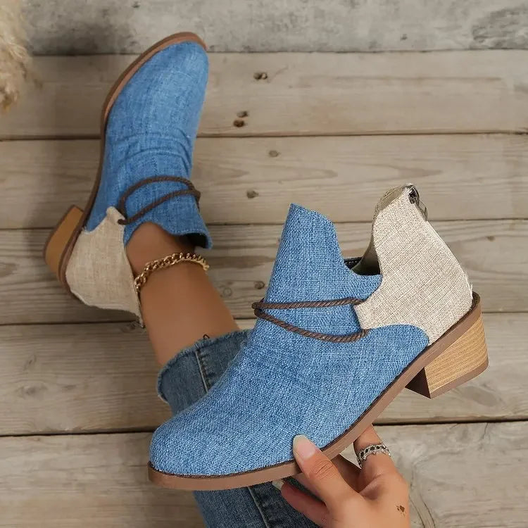 Women's woven ankle boots featuring a comfortable block heel, stylish & durable.