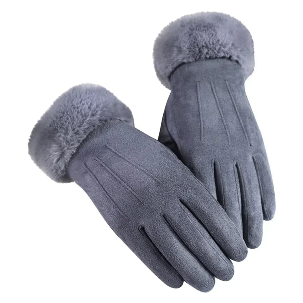 Fashionable women's suede gloves, offering warmth and touchscreen functionality for winter days.