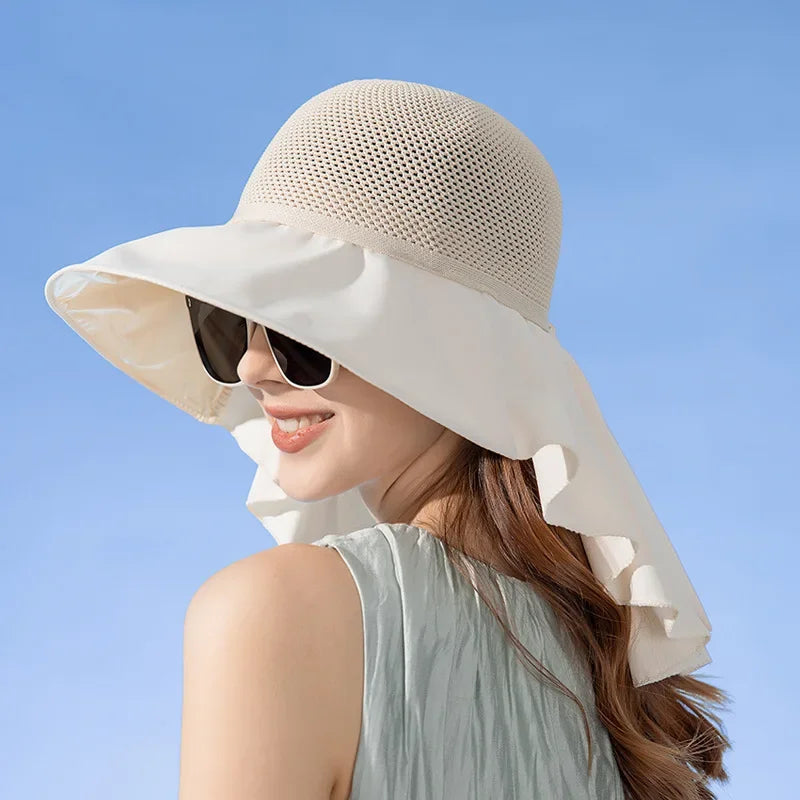 Chic women's sun protection hat with wide brim & detachable shawl for ultimate UV coverage.