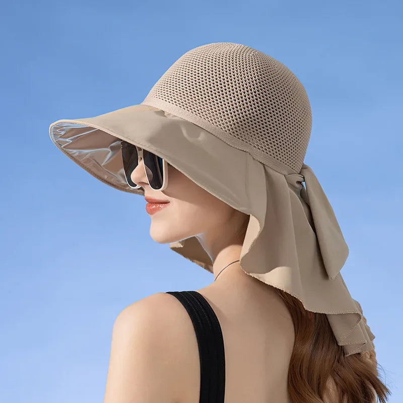 Foldable wide-brim women's beach hat with sun protection shawl, ideal for summer travel.