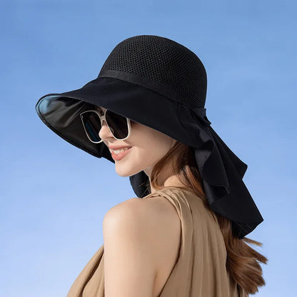 Portable wide-brim women's sun hat with a protective shawl, easily folds for travel convenience.