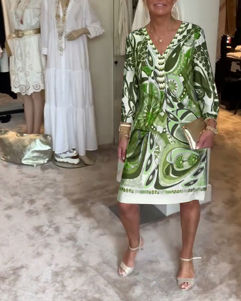 Everyday wear sunburst print tunic dress for women, featuring a relaxed boho fit and artistic pattern.