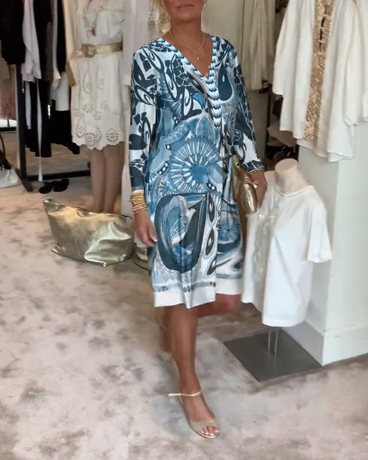 Bohemian sunburst print V-neck tunic dress for women, perfect for relaxed casual summer days.