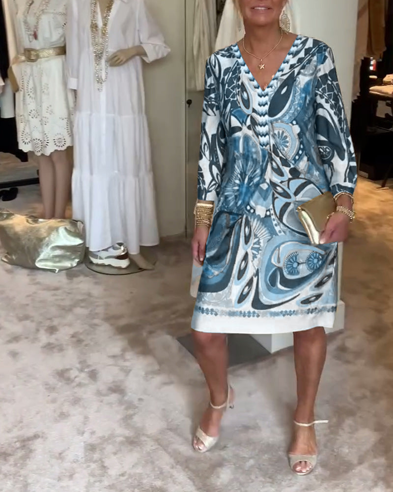 Relaxed fit V-neck sunburst print tunic dress, a bohemian choice for women's summer casual style.
