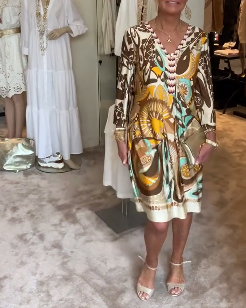 Casual boho sunburst print dress for women, offering a comfortable, relaxed fit and retro style.