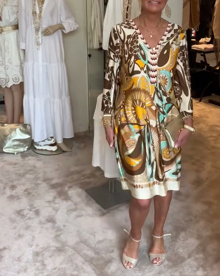 Casual boho sunburst print dress for women, offering a comfortable, relaxed fit and retro style.