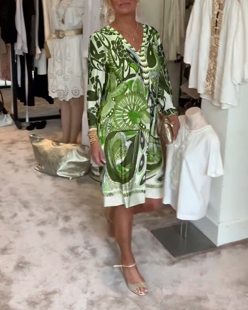 Vibrant sunburst patterned tunic dress, a relaxed boho style ideal for women's summer fashion.
