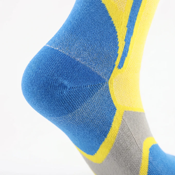 Supportive black knee-high sports socks for women, designed for running, fitness & ultimate comfort.