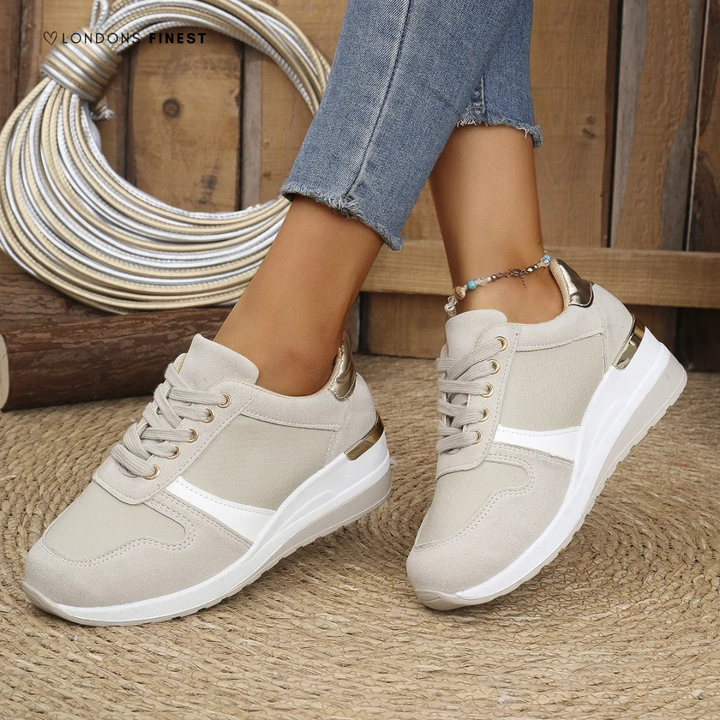 Women's supportive orthopedic sneakers with arch support for all-day comfort, ideal for walking & everyday wear.