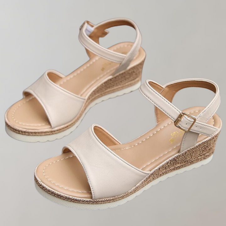 Stylish women's platform sandals with adjustable straps and open toe, perfect for casual summer outfits.