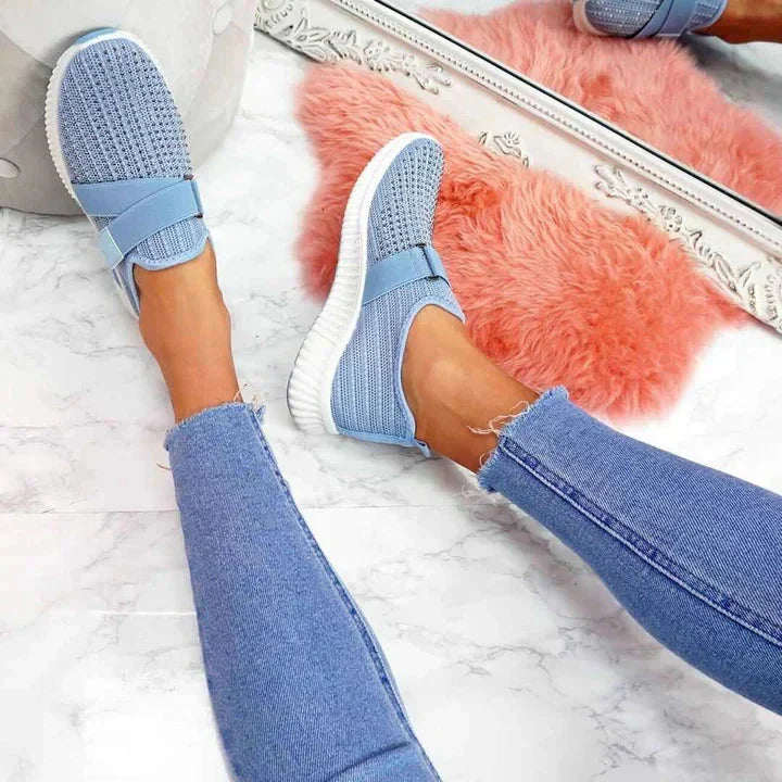 Women's supportive slip-on sneakers for enhanced posture. Comfortable walking shoes with breathable design.