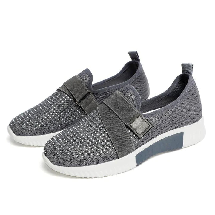 Women's supportive slip-on sneakers, perfect for walking & enhanced posture. Casual everyday wear.