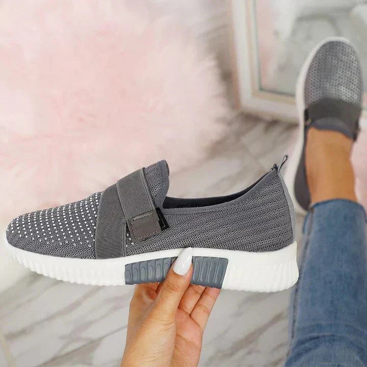 Fashionable women's slip-on sneakers with adjustable fit & superior arch support for long walks.