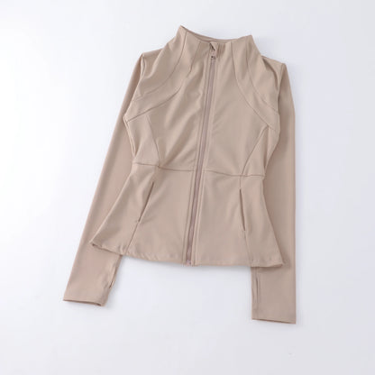 Stylish women's yoga top with stand-up collar. Elegant activewear for fitness, gym, and layering.