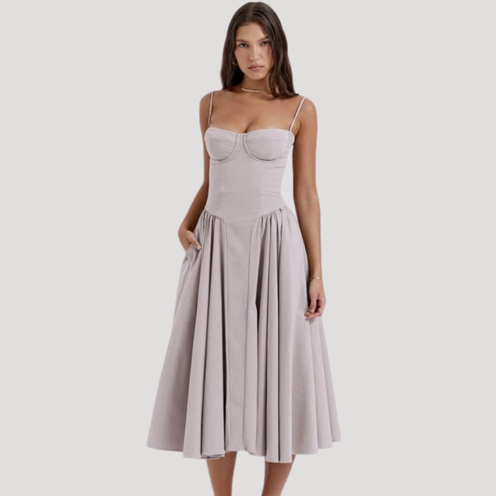 Flowing A-line skirt of a women's sweetheart corset midi dress. Beautiful formal & party occasion wear.