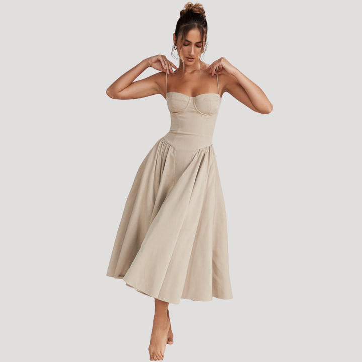 Close-up of sweetheart corset bodice on elegant women's A-line midi dress. Perfect for formal events.