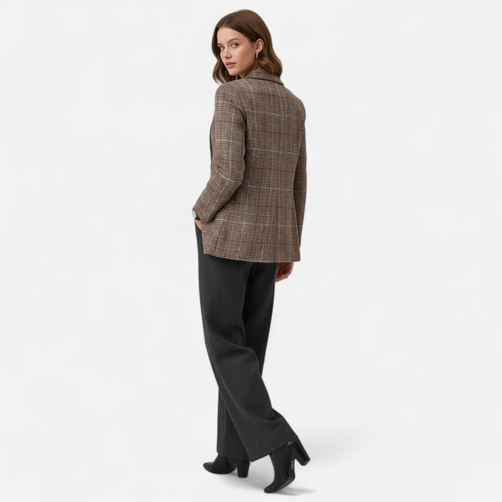 Stylish women's brown plaid tailored jacket, single-breasted, offering a chic and professional look for work.