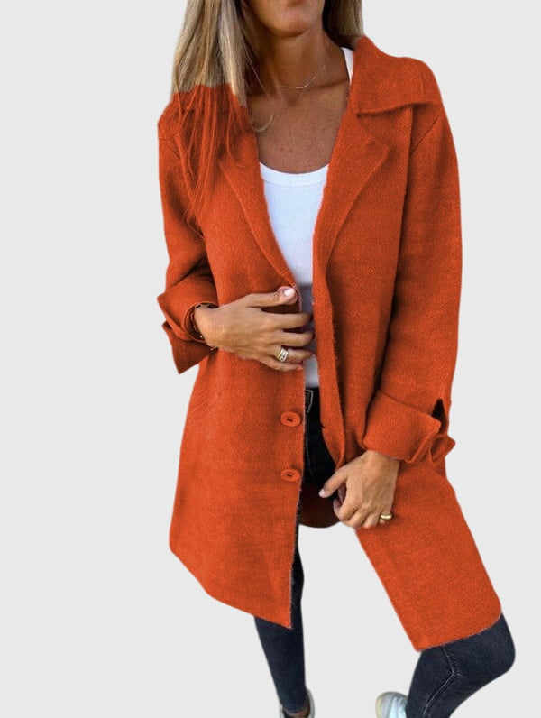 Versatile women's tailored button blazer, a chic jacket perfect for elegant work wear or everyday fashion.