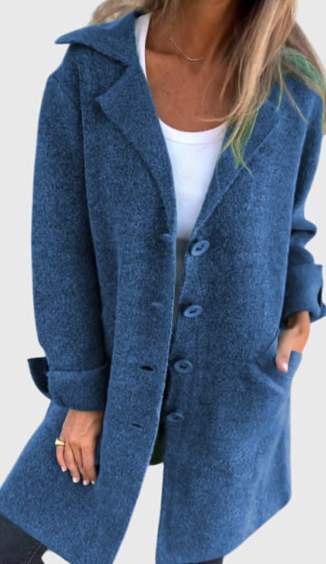 Fabric detail of a women's button blazer, a high-quality tailored jacket for sophisticated business casual style.