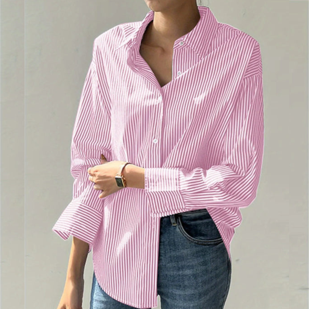 Gray women's executive shirt, tailored for modern professional workwear. Long-sleeve blouse, ideal for office attire.