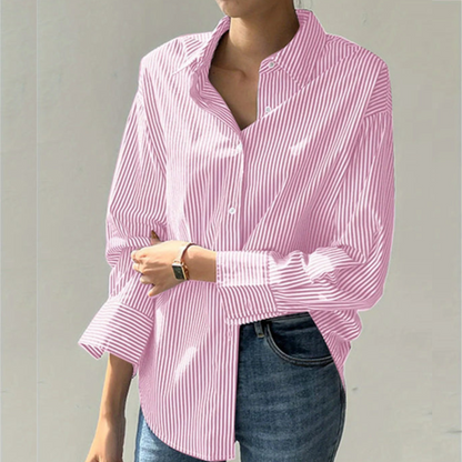 Gray women's executive shirt, tailored for modern professional workwear. Long-sleeve blouse, ideal for office attire.