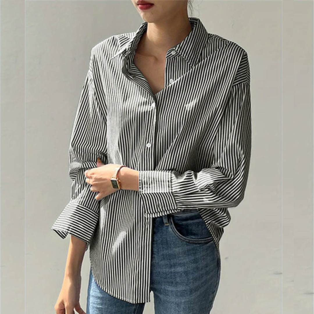 Pink women's elegant executive shirt. Tailored long-sleeve blouse for professional attire, boosting confidence at work.