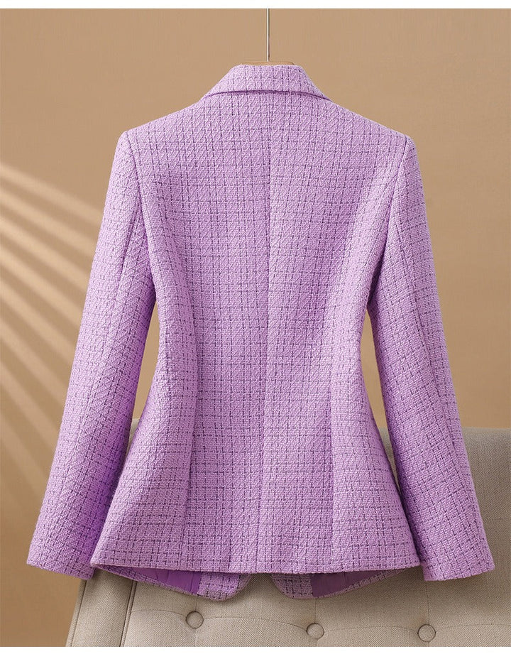 Modern classic white structured blazer. Versatile women's long sleeve jacket for elegant business wear.