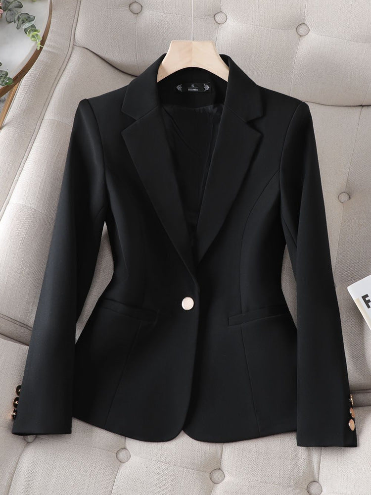 Professional women's structured blazer in a classic fit, offering an elegant edge for office or formal occasions.