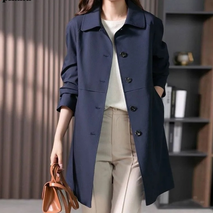 Elegant women's tailored trench coat, versatile for office wear or chic casual style. Slim fit autumn/spring jacket.