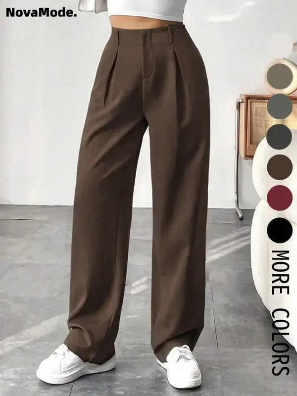 Chic women's wide-leg trousers, tailored fit for comfort & style. Ideal for modern workwear.