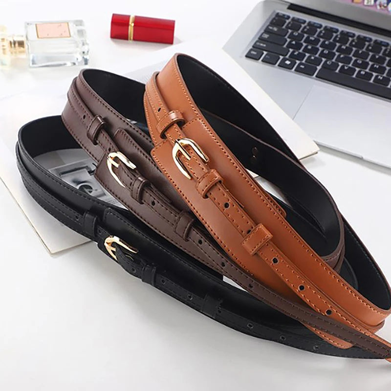 Tan dual-strap vegan leather waist belt for women, a fashionable and versatile accessory.