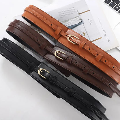 Dress up your outfit with this women's adjustable brown dual-strap vegan leather waist belt.