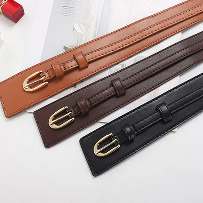 Women's fashion accessory: dual-strap vegan leather waist belt, available in tan, brown, black.