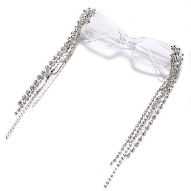 Fashionable women's sunglasses with sparkling rhinestones, elegant tassels, & UV protection.