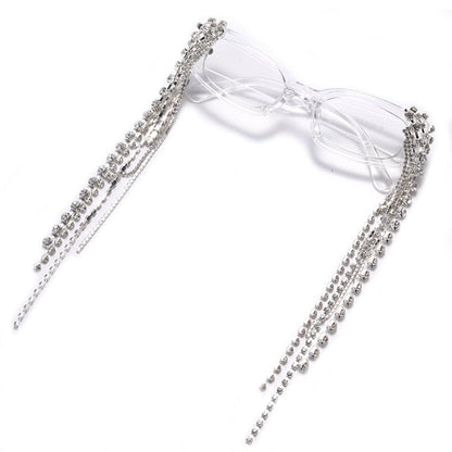 Fashionable women's sunglasses with sparkling rhinestones, elegant tassels, & UV protection.