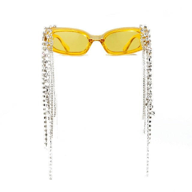 Front view: women's fashion sunglasses with sparkling rhinestones, tassels, & UV protective lenses.