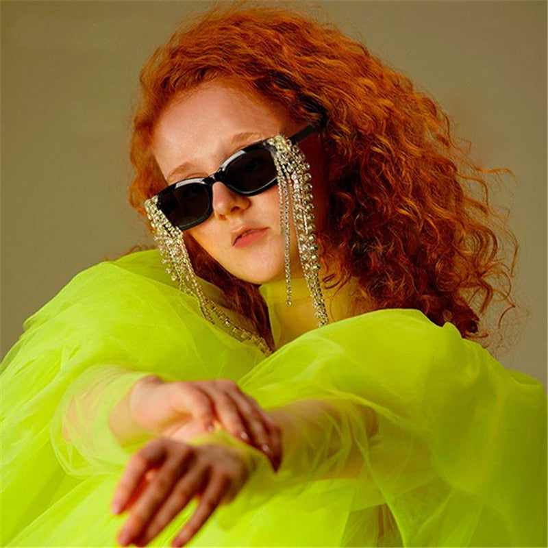 Side view of women's elegant tassel rhinestone sunglasses, showcasing unique temple design.