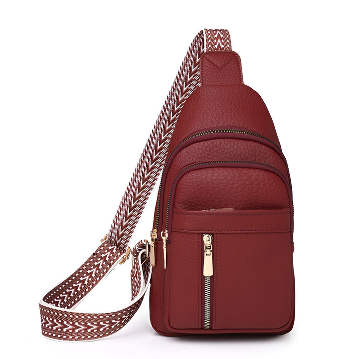 Close-up of textured fabric on women's anti-theft sling backpack showing durable, stylish material.