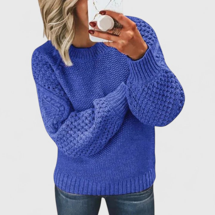 Women's textured knit sweater with stylish puff sleeves & mock neck. Cozy fall & winter fashion.