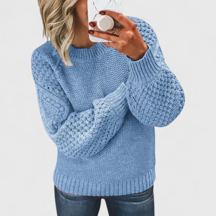 Women's long sleeve textured sweater, featuring elegant puff sleeves and a cozy mock neck. Great for layering.