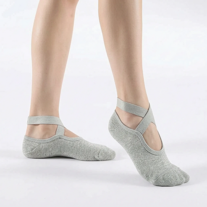 Women's textured non-slip yoga & pilates socks for improved grip, balance, and workout performance.
