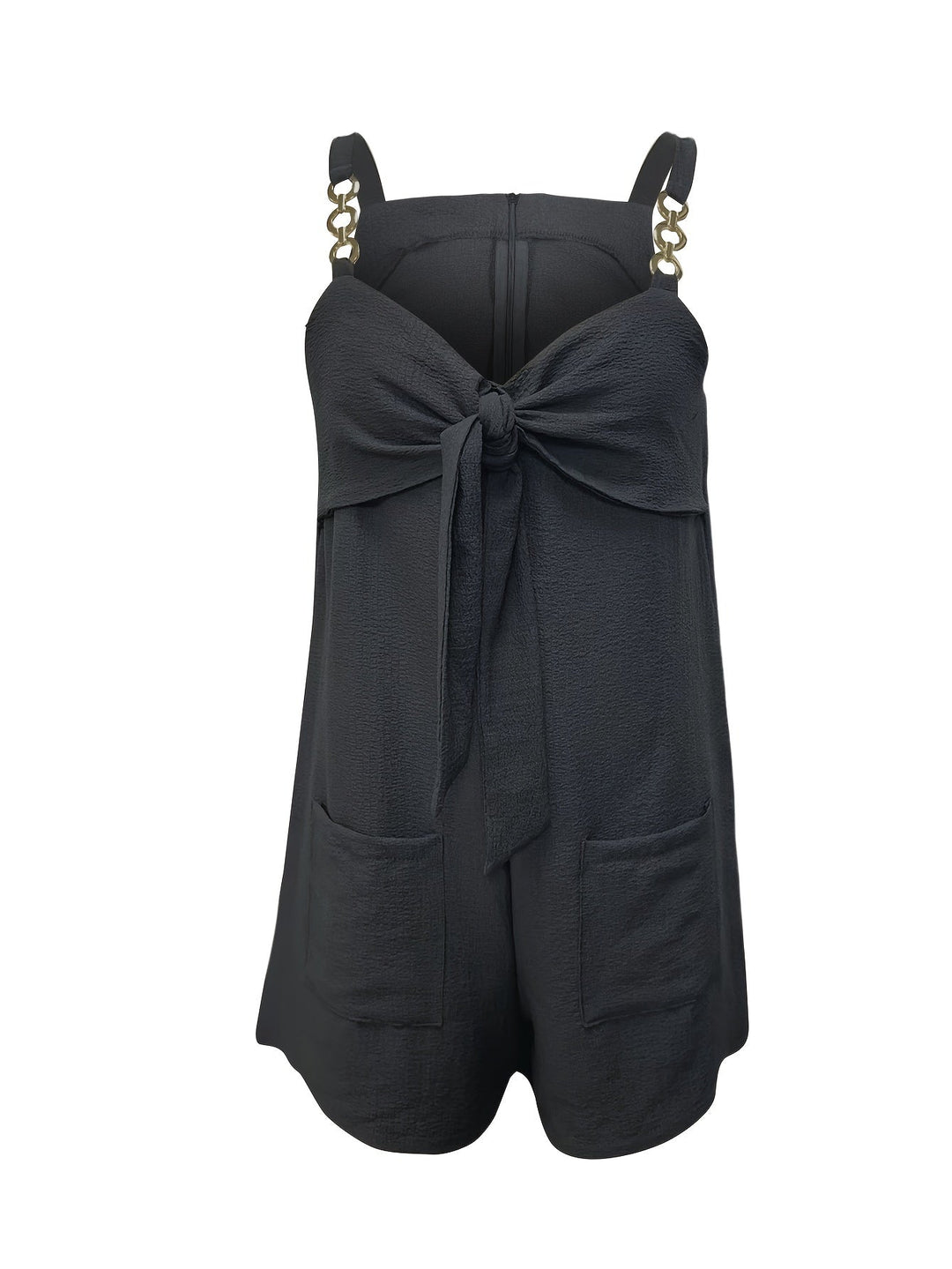 Detailed view of the chain straps on a green textured short romper with sweetheart bow.
