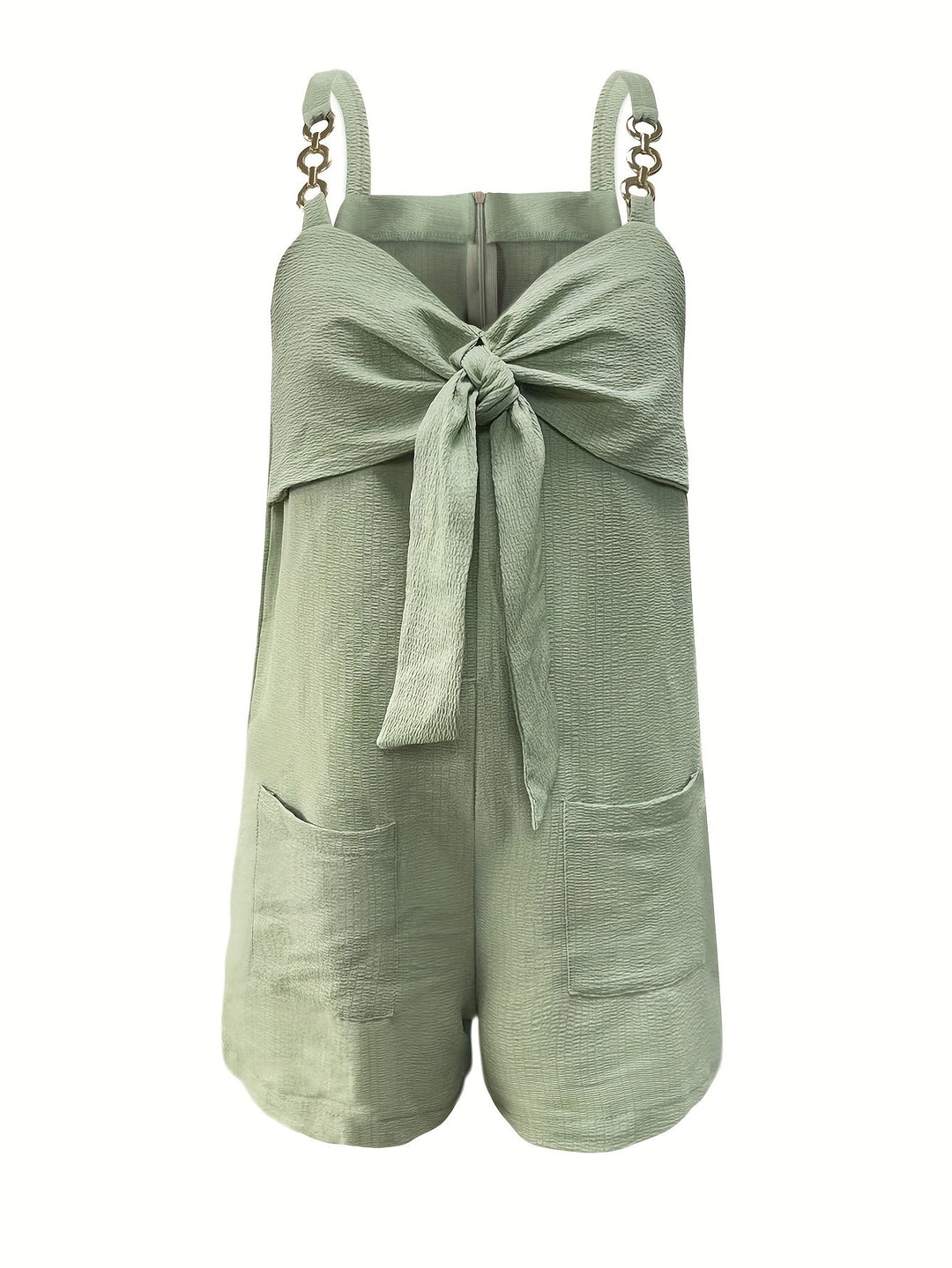 Vacation ready! Pale pink textured short romper, featuring chain straps & a sweetheart bow.