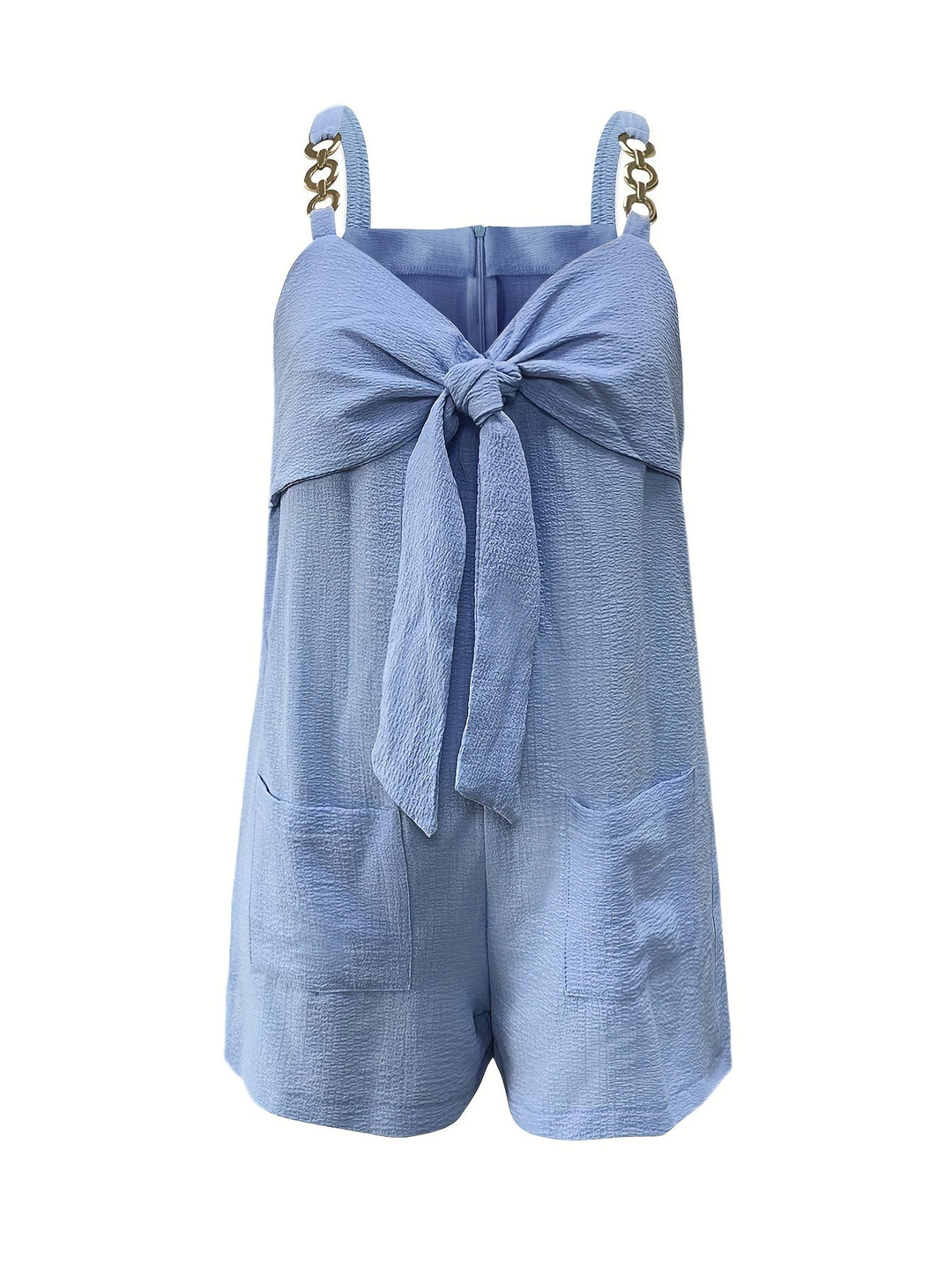 Women's textured black romper with prominent sweetheart bow and stylish chain straps.