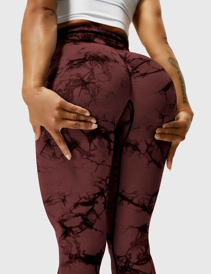 Women's tie-dye yoga leggings, comfortable for stretching.